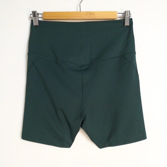 Girlfriend Collective High-Rise Run Short in Moss - Picture 3 of 5